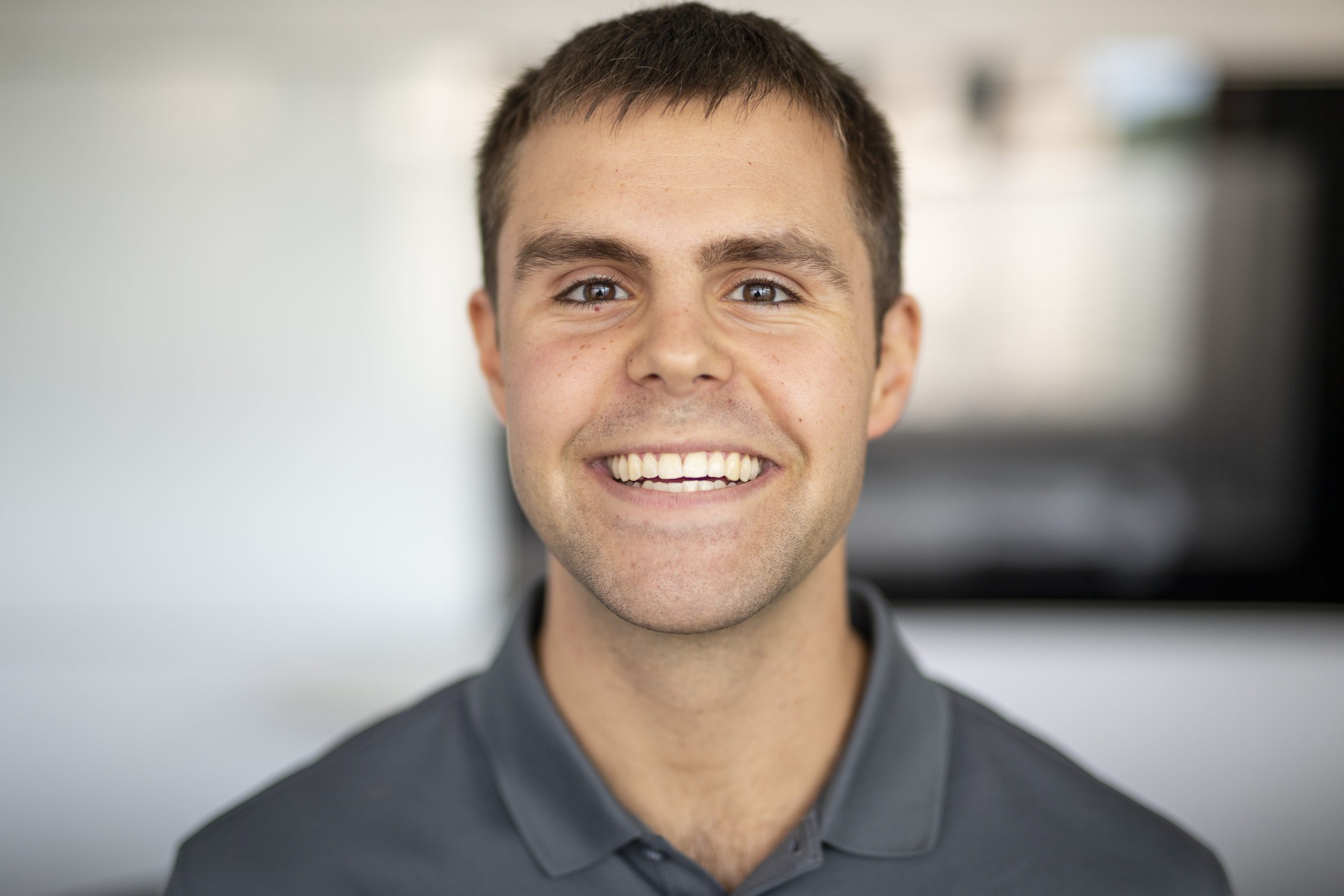 A man smiles