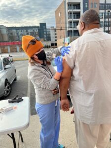 Maddy Ball and other student volunteers help to give vaccines in Nashville through Shade Tree Clinic.
