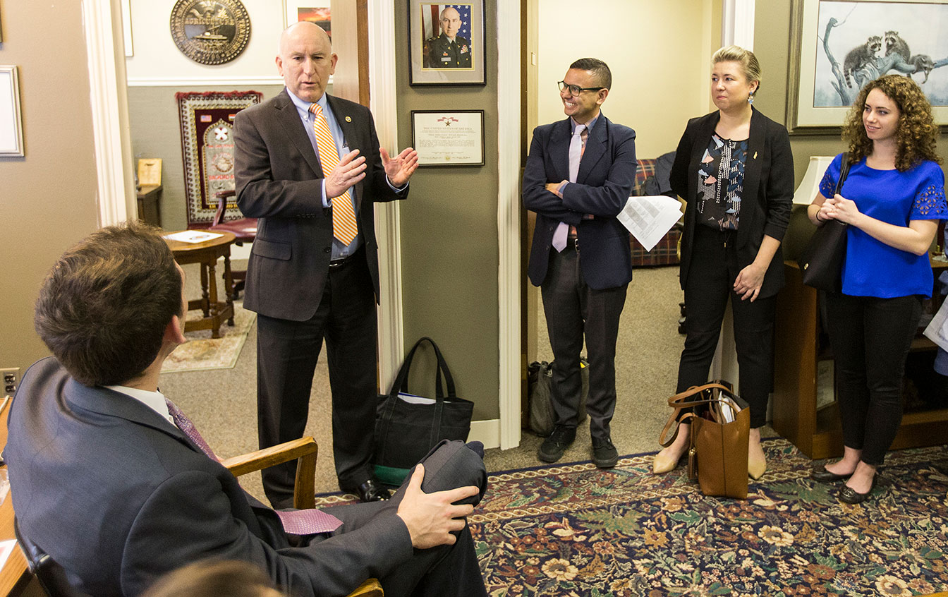 Sen. Richard Briggs meets with Gilbert Gonzales and students from “The Nation’s Health” University Course.